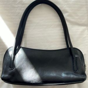 Black leather shoulder bag. Made in Italy